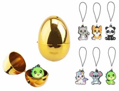 Golden Plastic Capsule With Soft PVC Charm